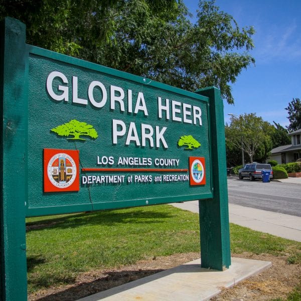 Gloria Heer Park sign from left