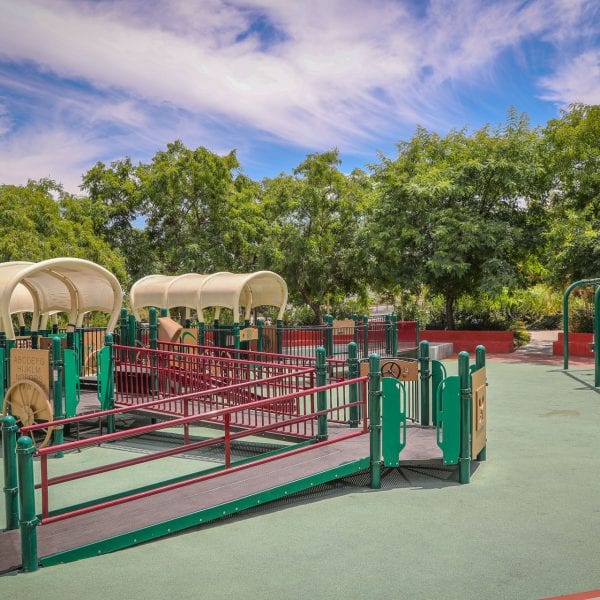 Playground with wagon-style tunnels