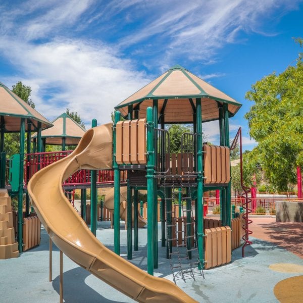 Playground with long slide wrapping around