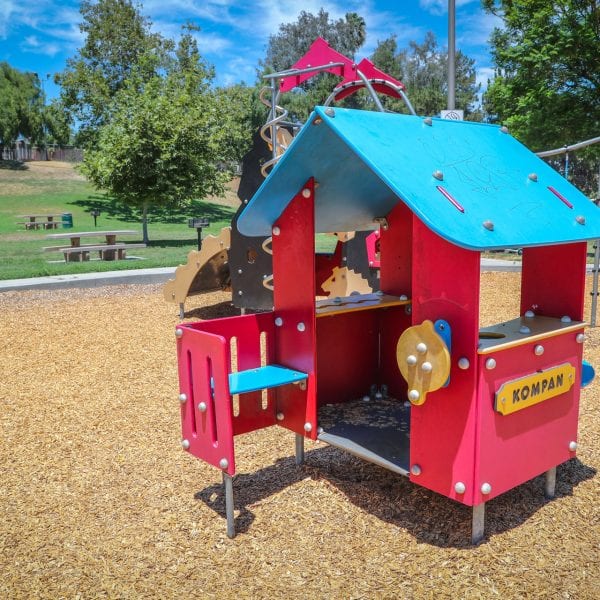 Playground unit on a wood chip bed