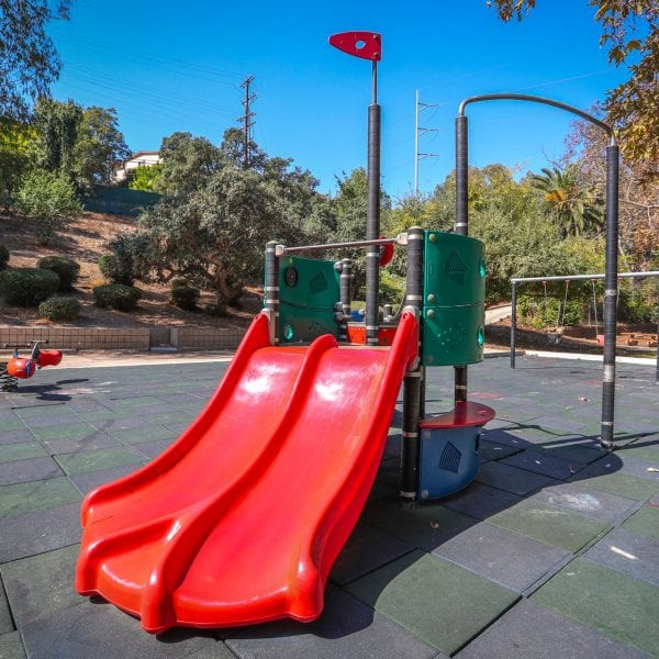 Playground on a rubber tile turf