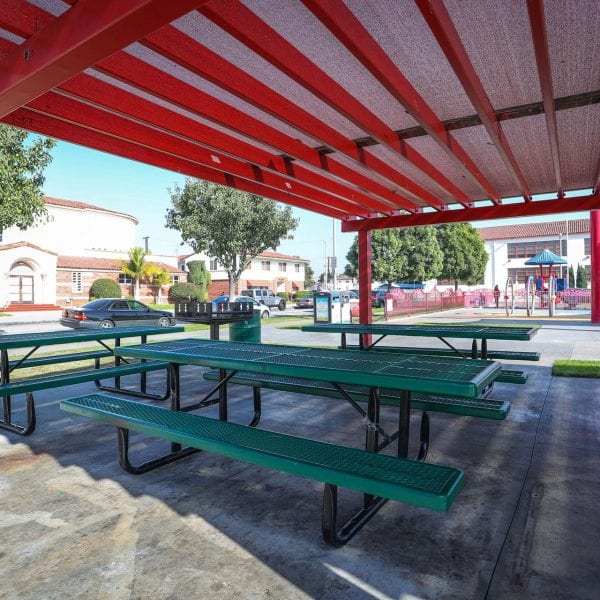 Picnic tables under an awning
