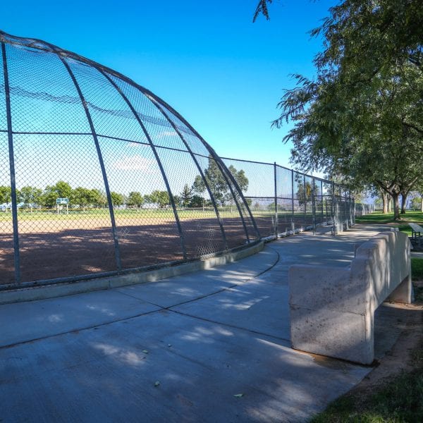 Baseball net with bench outside