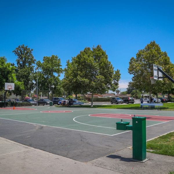 Outdoor basketball court with a drinking fountain