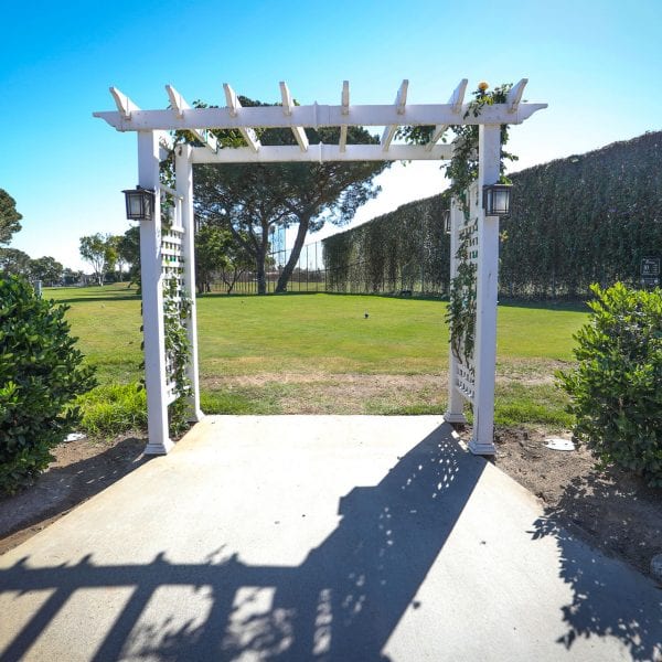Archway to a green lawn