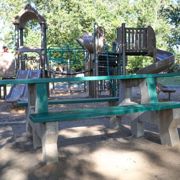Park bench and playground