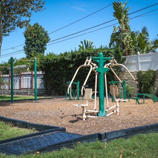 Exercise equipment on a wood chip turf